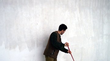 Brushing off loose dirt and grit