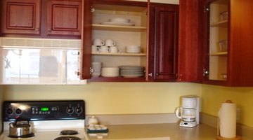 Wooden cabinets can support plate racks.
