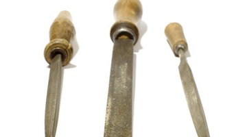 Sharpening pencil sharpener blades requires a small triangular file to reach around the twists and turns of the blades.