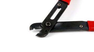 Adjustable wire strippers