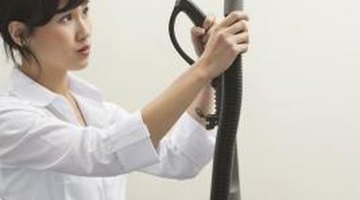use a vacuum to remove dust from interior brick walls