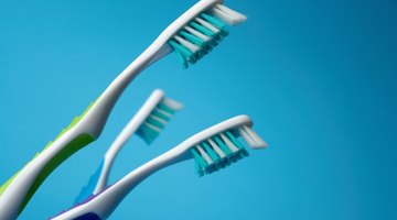 Use an old toothbrush to gently scrub stains away.
