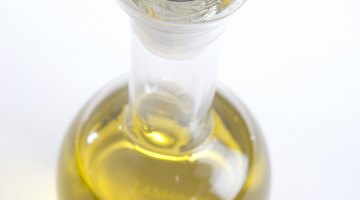 Cooking oil retains the necessary moisture needed for vinyl stickers to stick.