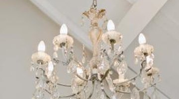 Ceiling molding can produce an elegant decorative effect that will not only hide the attic door but will create a stunning look