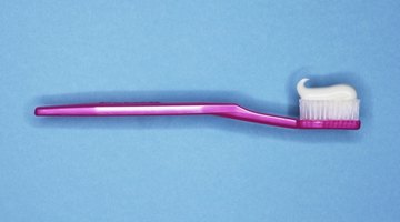 Toothpaste scrubs off dye stains on rubber.
