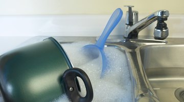 Pour a bleach and hot water mixture down your drains every day to kill the silverfish inside of your pipes.