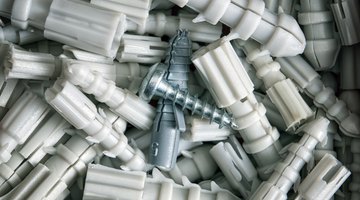 Pile of masonry anchors and screw