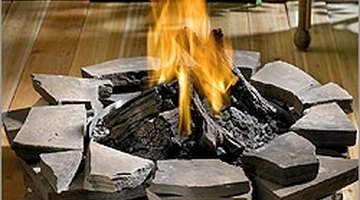 Gas fire pit at http://www.csnfireplaces.com/asp/show_detail.asp?sku=NPN1522&PiID=2364878&PiID=2365110&PiID=2365108&refid=XT39-NPN1522_2364878_2365110_2365108