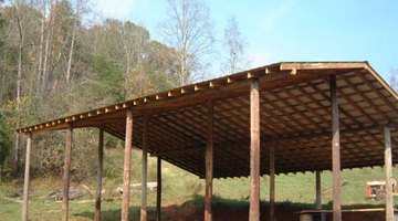 A pole barn is among the easiest DIY hay barns to complete.