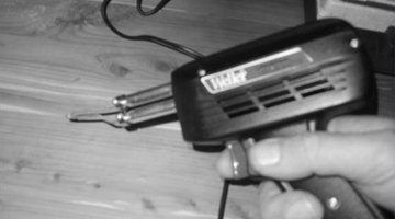 Holding The Gun