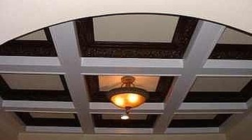 You can use paint grade cladding and stain grade crown for this beautiful finished look