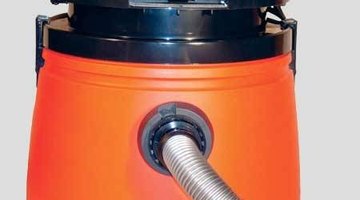 Vacuum out debris using an attachment.