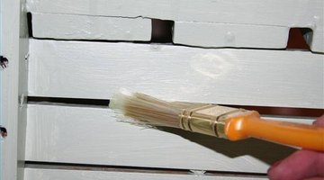 Use a small brush between slats.