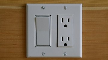 Remove switch plates by removing screws with a screwdriver.