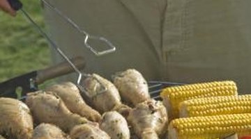 Long-handled tongs prevent burns.
