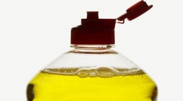 Grease-cutting dishwashing detergent helps clean greasy nylon brushes.